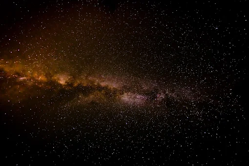 Universidade de Coimbra | Como um buraco negro pode estar a eliminar estrelas binárias do centro da Via Láctea